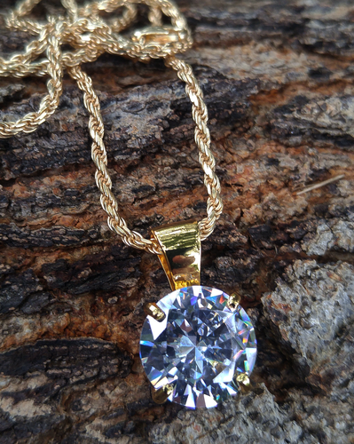 15mm simulated diamond pendant and 24in rope chain
