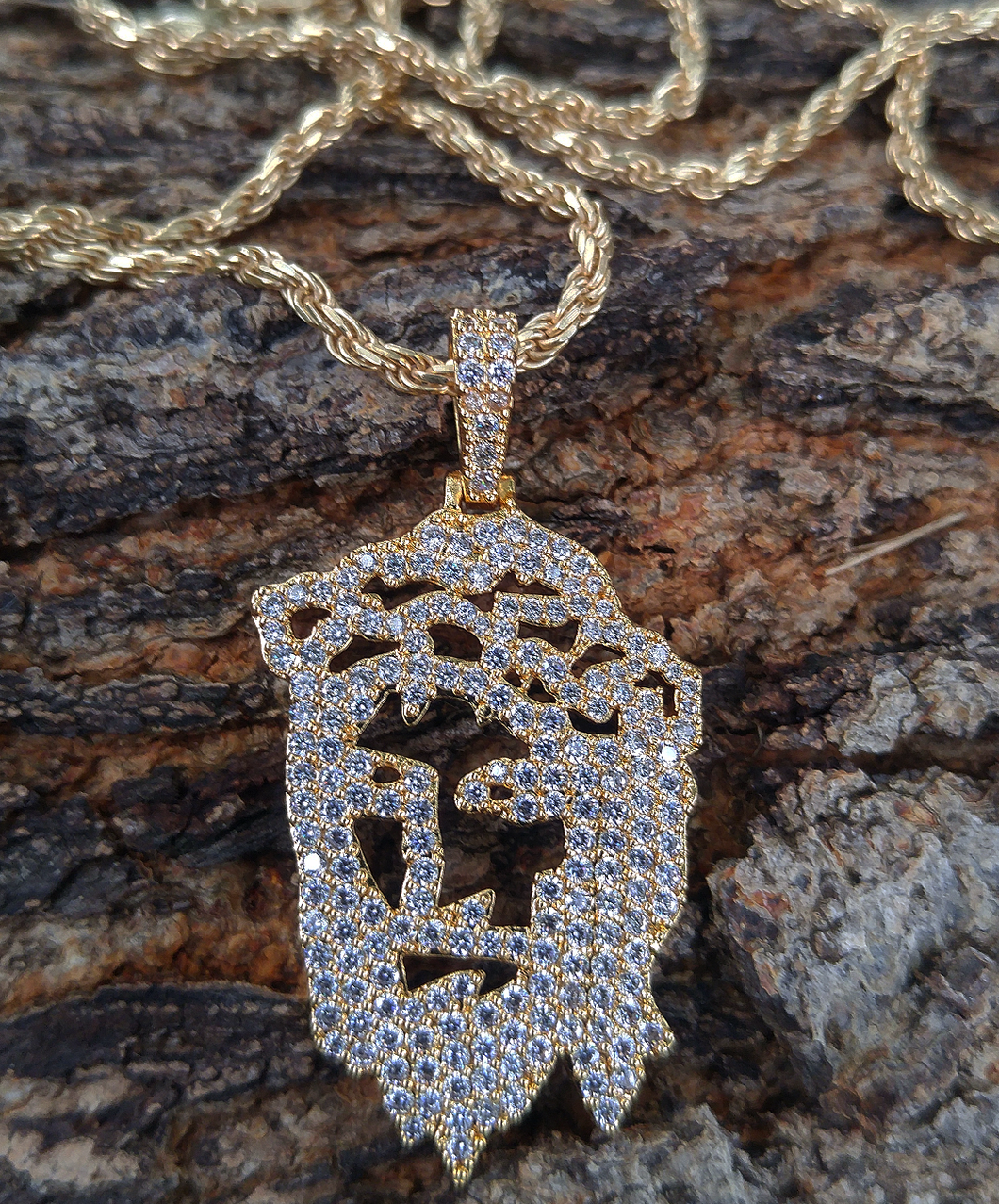 gold finish jesus outline with 24in rope chain