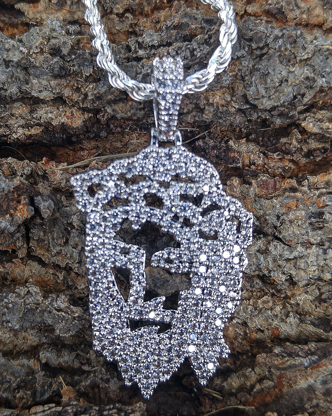 white gold finish cut out jesus piece & 24in rope chain